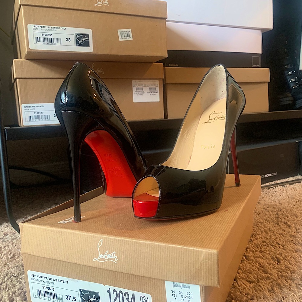 Christian Louboutin Black And Red Bottom Stilettos